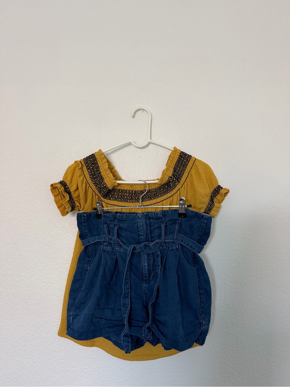 off-the-shoulder top and paper bag shorts set